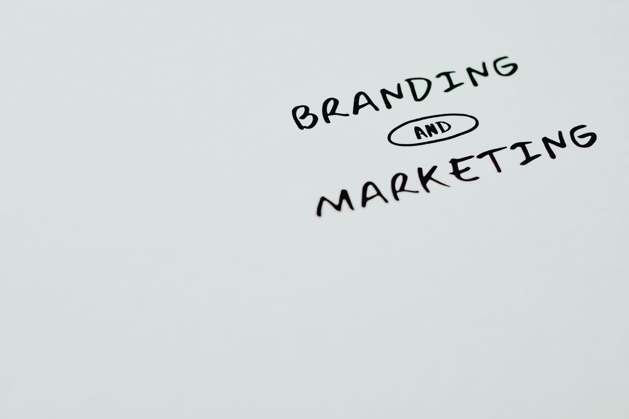 gallery-4 A minimalist image featuring the words 'Branding' and 'Marketing' on a white background, ideal for digital marketing themes.